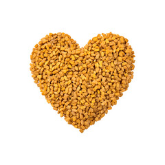 Heart-shaped arrangement of fenugreek seeds
