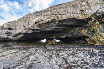 Ojerada Cave over Atlantic shore near Ajo town in northern part of Spain