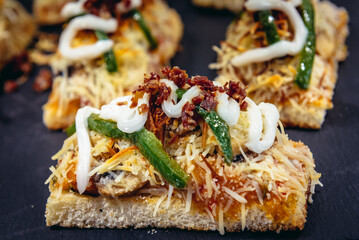 Traditional snacks called pinchos in tapas bar in San Sebastian city also called Donostia in Basque Country, Spain