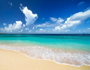 Fototapeta premium Beautiful beach with white sand, turquoise ocean water and blue sky with clouds in sunny day.jpg