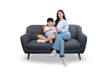 A heartwarming image of a mother and son sharing an embrace on a sofa against PNG background