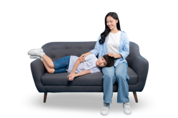 A mother and son enjoying a moment of tenderness and togetherness while relaxing on the sofa