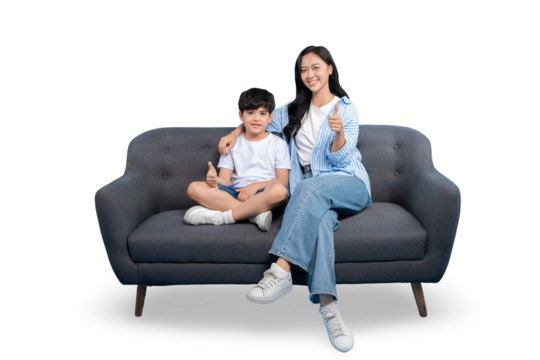 A mother and child seated comfortably on a sofa, sharing a moment of togetherness and positivity. - Powered by Adobe