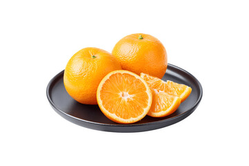 Fototapeta premium Two mandarin oranges and their slices served on a black plate for Chinese New Year 