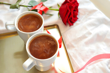 Fresh aromatic coffee in bed. Coffee for two.
