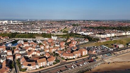 Fototapeta premium Drone Aerial View of Roker Beach, Seaburn Beach, and Roker Pier in Sunderland, Tyne and Wear, North East England, Coastal Landscape from Above