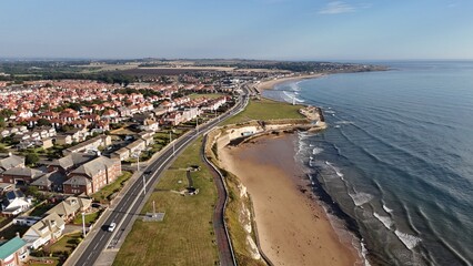 Drone Aerial View of Roker Beach, Seaburn Beach, and Roker Pier in Sunderland, Tyne and Wear, North East England, Coastal Landscape from Above