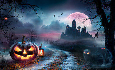Halloween Pumpkins On Road With Medieval Castle At Moonlight - Jack O' Lantern In Spooky Night