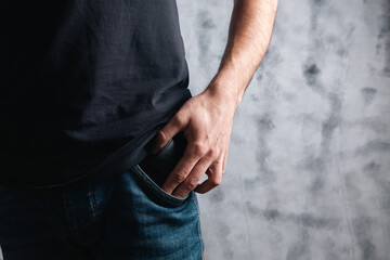the man pulled his wallet out of his pocket