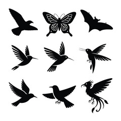 Obraz premium Black silhouette illustrations of flying birds and a butterfly