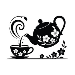 Black teapot pouring tea into cup with floral design