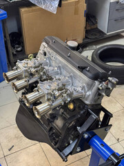 Revved up mechanical heart pulses in garage temple, capturing the spirit of Gearhead Day and International Inventors' Month