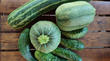 Crunchy herbaceous cucumbers and quirky zucchini commune on rustic plank, invoking Garden Meditation Days vibrant vegetarian dreams