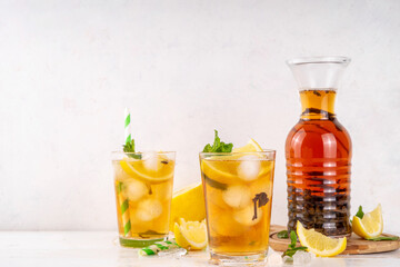 Iced tea cocktail drink, cold summer drink with black tea