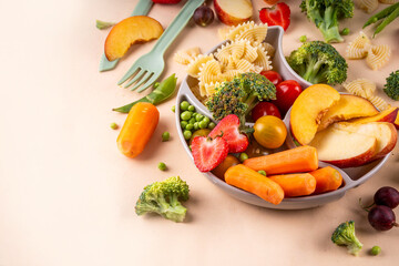 Baby finger food, various baby snacks, pasta, vegetables, fruits