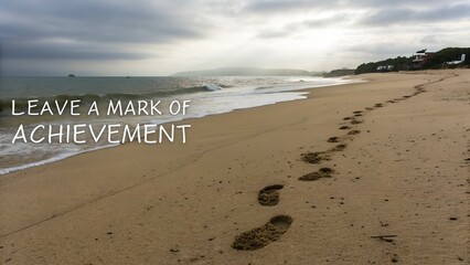 Tranquil Beach Scene with Footprints and Inspirational Text