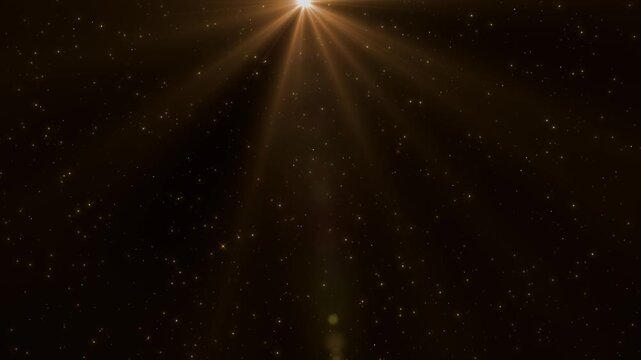 Magical animation glowing particles falling under warm golden rays. gentle downward motion of sparkles creates dreamy ambiance for festive, cinematic, spiritual, cosmic or fantasy video projects