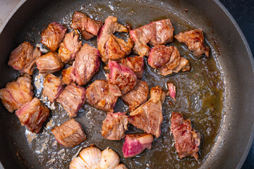 top view beef dices being cooked