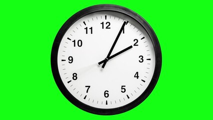 Time lapse video (looped) of a full 12-hour rotation of the hands of a classic black and white wall clock against a green screen chromakey background.