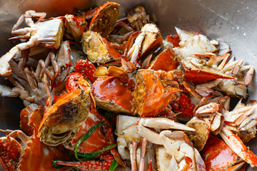 home-style stir-fried crab in a large wok