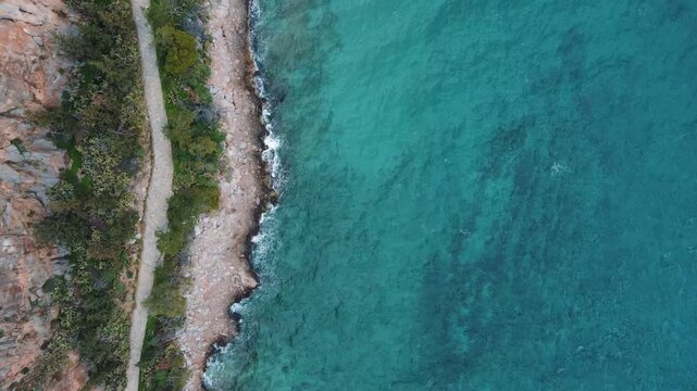 Aerial Mediterranean sea top down from Paralia Arvanitias beach winter in Nafplio