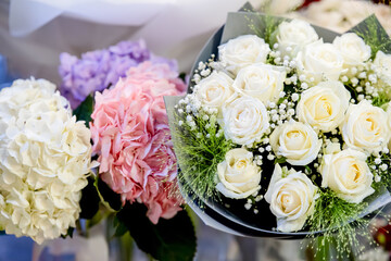 Bouquets of hydrangeas and white roses. Wedding image. Home decoration. 