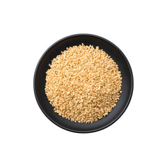 White sesame seeds served on a black plate

