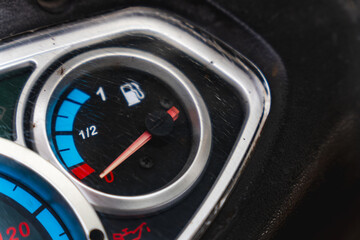Close up of motorcycle fuel gauge showing empty tank