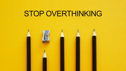 Stop overthinking and quiet your mind. Stop over thinking and don't think too much is shown using the text