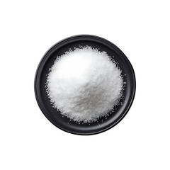 A pile of sugar served on a black plate for food photography
