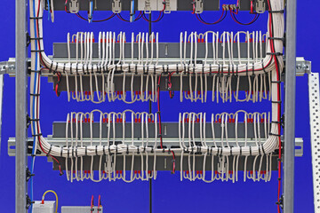 The reverse side of the electrical panel. Under copper insulated electrical wires to modules...