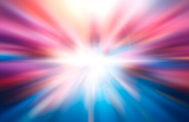 Abstract bokeh image of radiant light beams in vibrant colors.