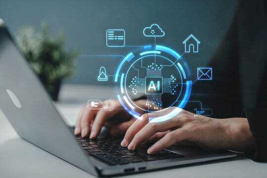 Close-up of hands typing on a laptop keyboard with glowing ai digital interface overlay showing cloud and data icons and technology concept.