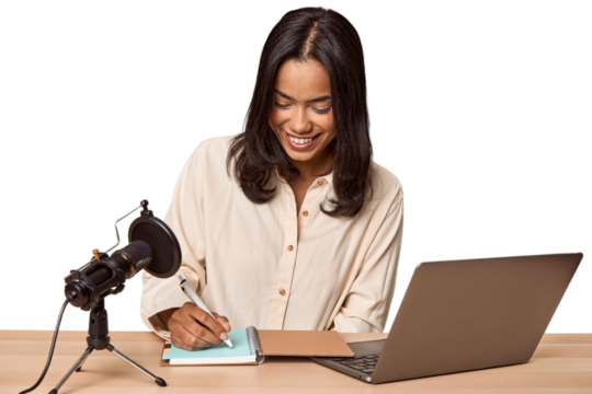 Filipino woman podcasting with mic and laptop