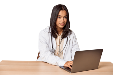 Thoughtful Filipino vet at desk, focused on care