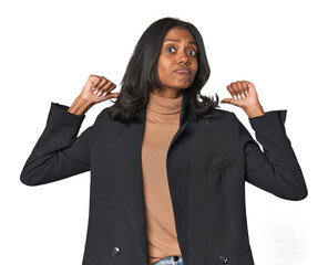 Young Indian woman in business suit feels proud and self confident, example to follow.