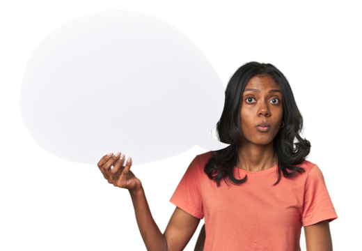 Indian woman with dialogue bubble shrugs shoulders and open eyes confused.