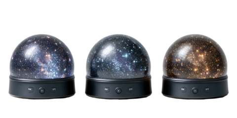 Three sphere-shaped night lights, each displaying a starry night sky projection in a different color scheme