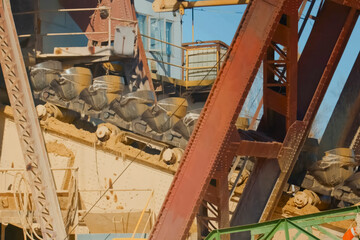 buckets of a multi bucket excavator for gold ore mining.