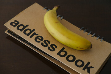 Conceptual creative bananas on wooden table, Ripe yellow bananas, rich in potassium, healthy...