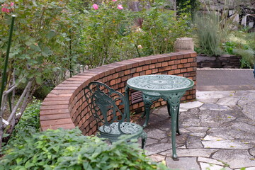 table and chairs in a garden
