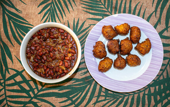 Fritters and red beans in sauce &ndash; Traditional African breakfast