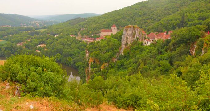 Hilltop Village Of Saint-Cirq-Lapopie In South-western France. Aerial Wide Shot