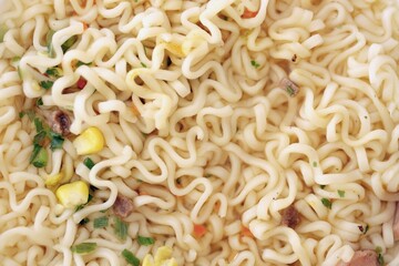 Noodles with spicy sauce and green onion chopped parts