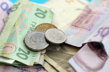Big amount of different Ukrainian hryvnia money bills. Pile of crumpled ukrainian banknotes