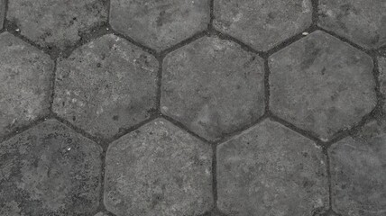 Textured Gray Hexagonal Pavers Forming an Outdoor Surface, Close Up of Interlocking Hexagonal...