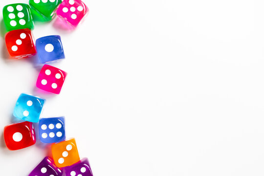 Colorful transparent dice on white background
