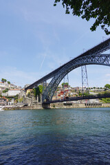 Naklejka premium The view of Luis I bridge in Porto, Portugal., panorama opening from Vila Nova De Gaia