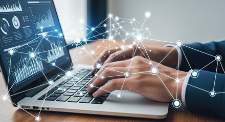 Close up of hands typing on a laptop with a glowing digital network overlay representing data and connectivity