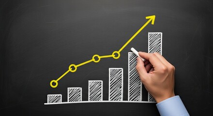 Hand drawing a rising bar graph and a yellow growth trend line on a dark chalkboard